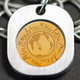 Image for article titled This Tiny Coin Contains a Microscopic Archive of 1,000 Different Languages